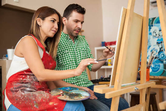 Couples engaging in art &amp; craft
